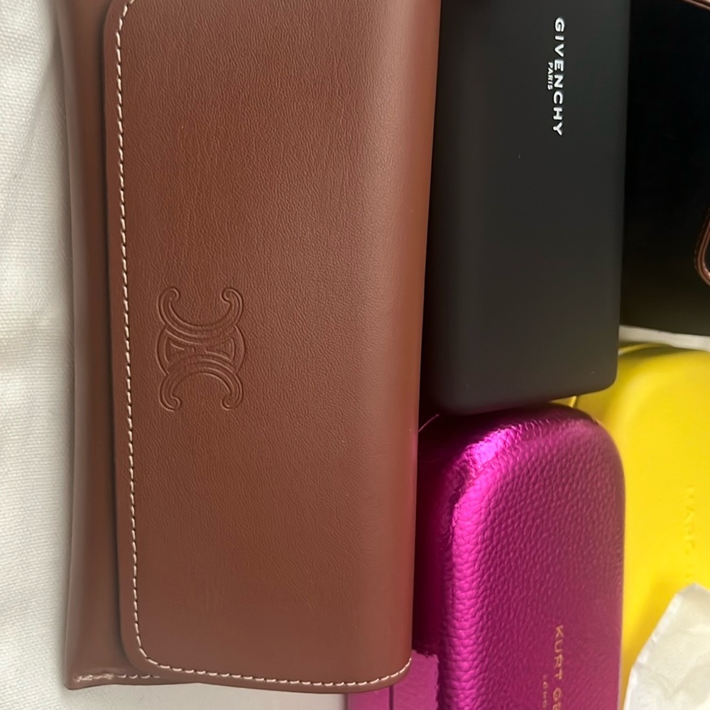 Celine sunglasses/eyeglasses case. Has a carrying  strap.